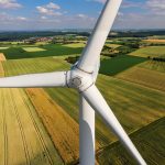 Wind turbine in farm field