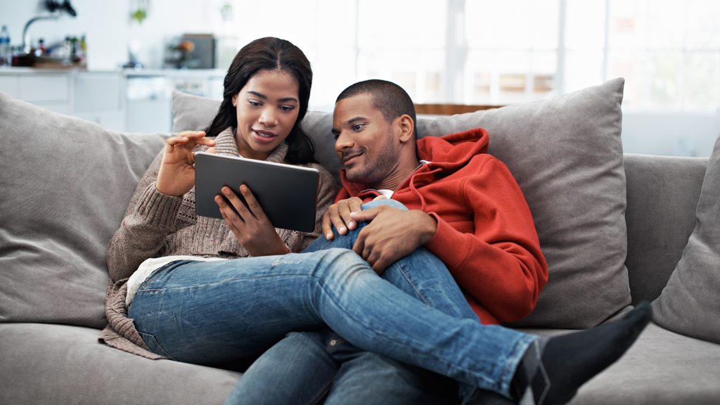 Couple looking at tablet