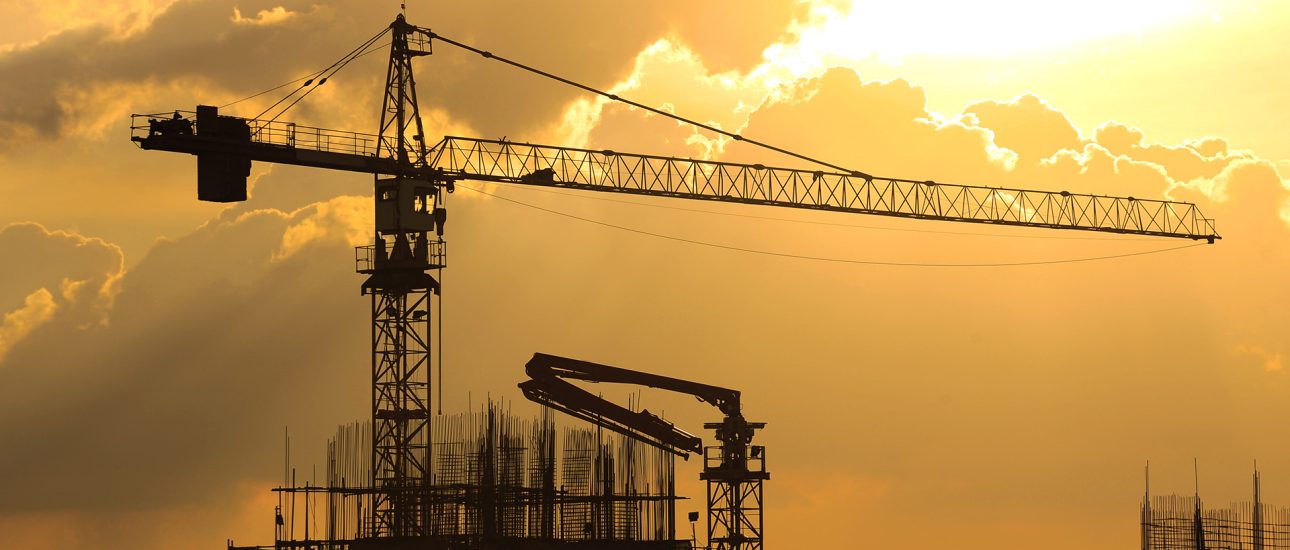 Building Under Construction with Crane