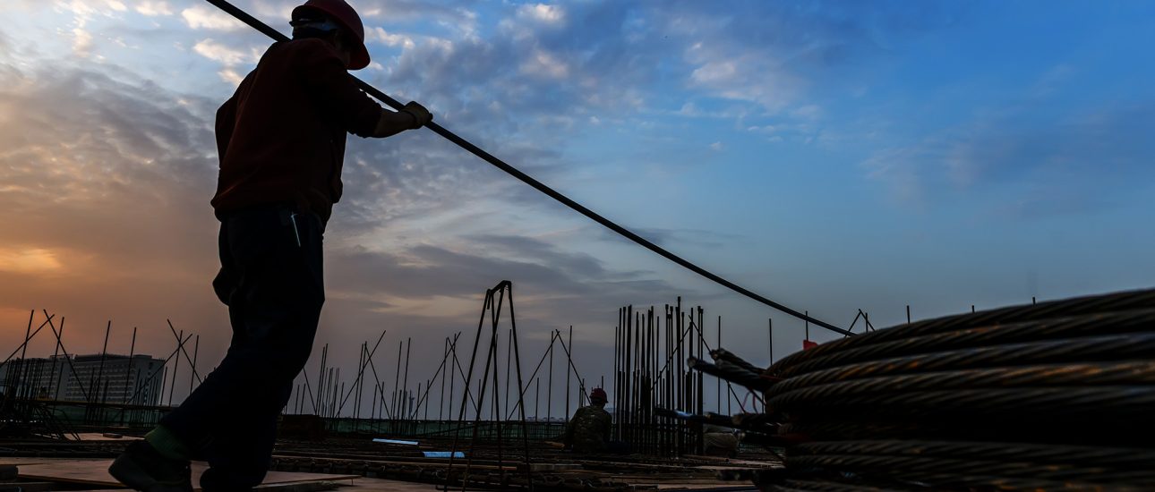 Construction worker with rebar