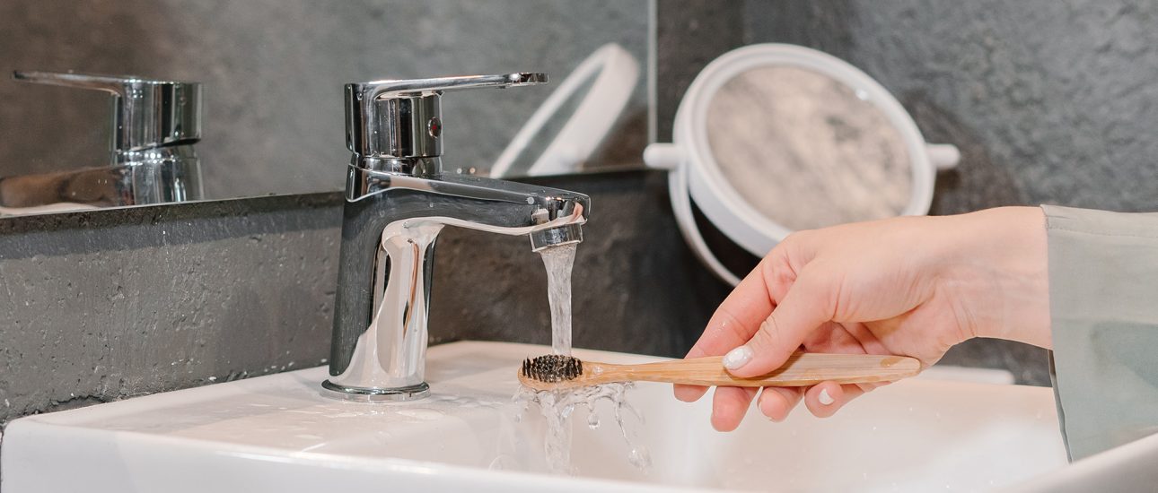 Brushing Teeth with a Bamboo Toothbrush