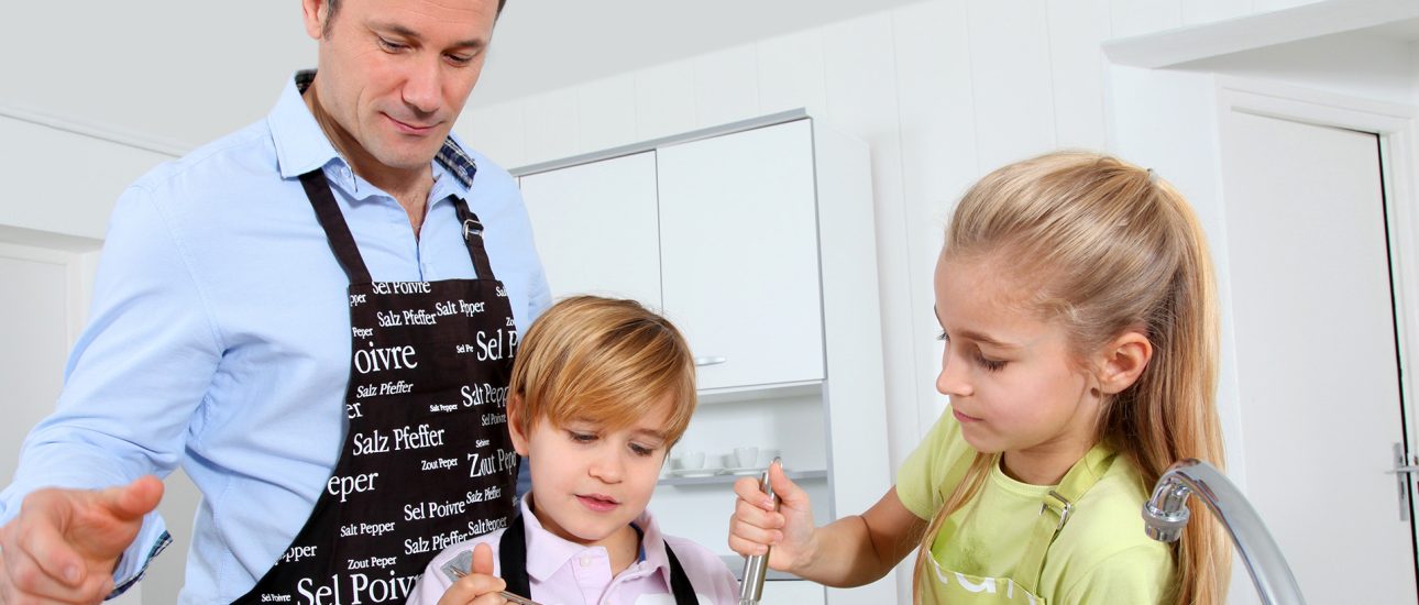 Dad cooking with children