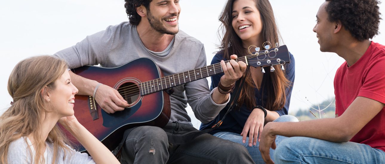 Group of friends with guitar