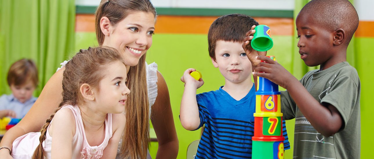 Kindergarten teacher with students