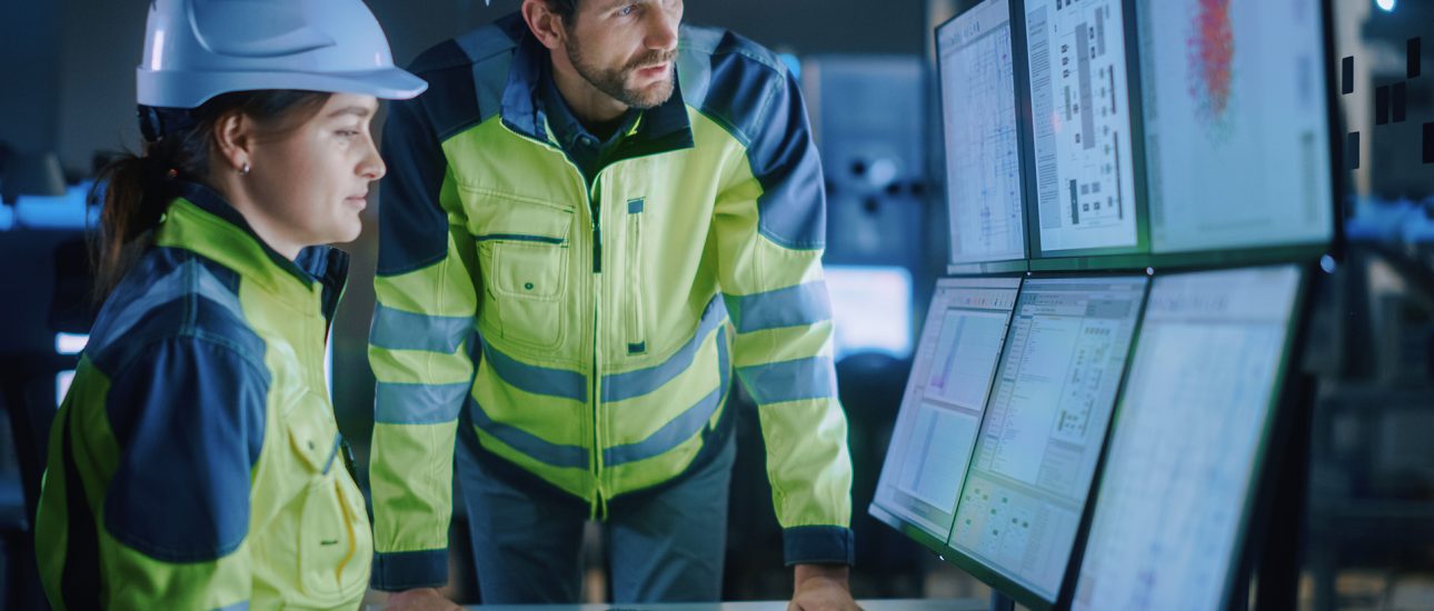 Engineers looking at SCADA