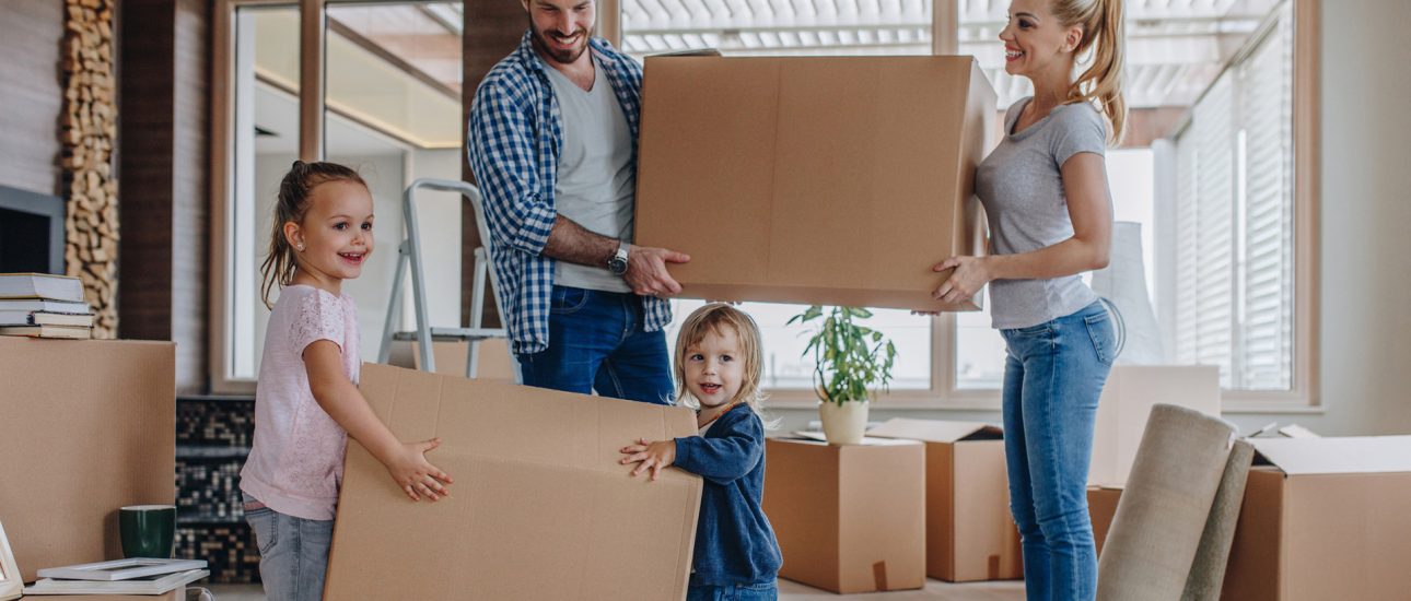 Young family moving into a new house