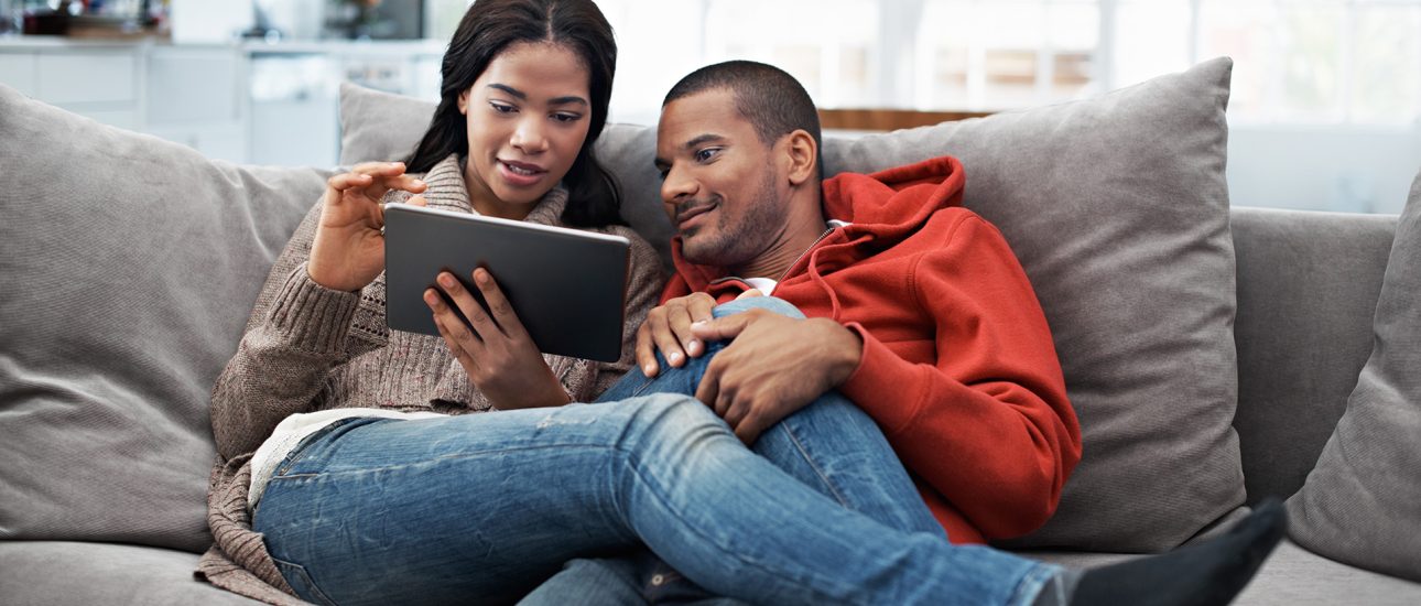 Couple looking at tablet