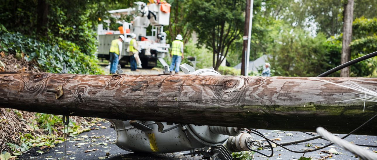 Down power lines and electric equipment in residential neighborhood